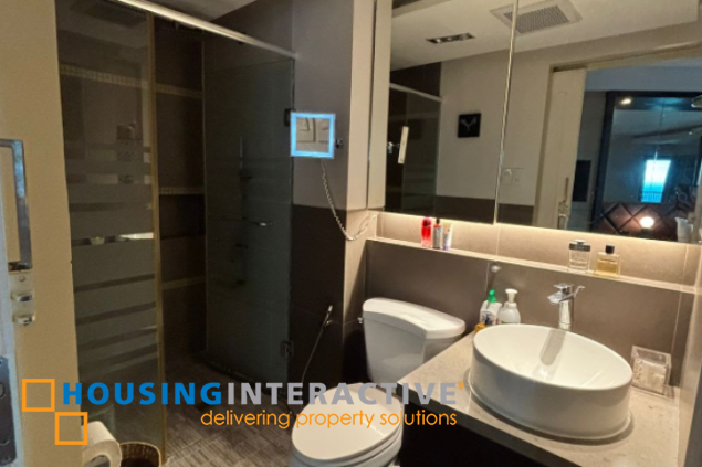furnished 1br with parking slots for sale in one rockwell east tower