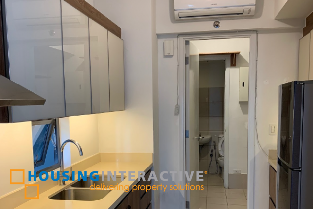 semi furnished 2br with parking for sale in arya residences, tower 2