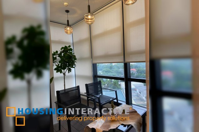 2 bedroom unit nicely interiored in garden towers  for sale