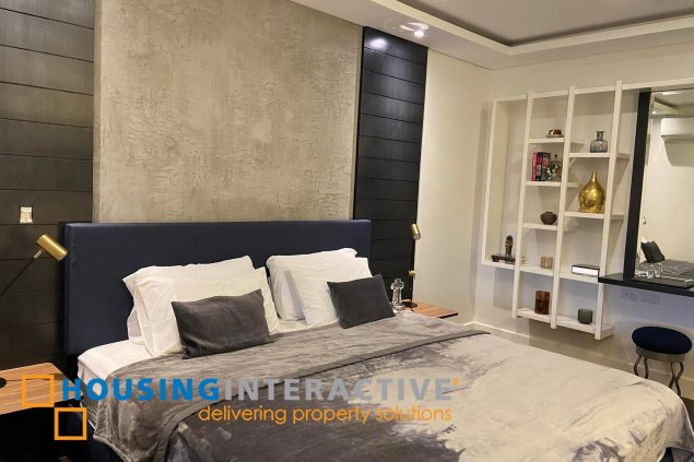 2 bedroom unit nicely interiored in garden towers  for sale