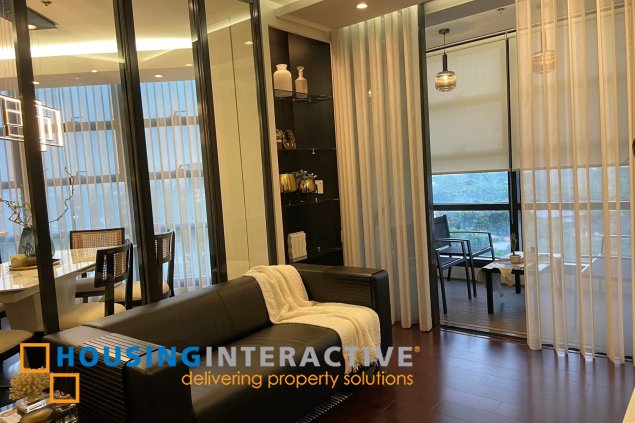 2 bedroom unit nicely interiored in garden towers  for sale