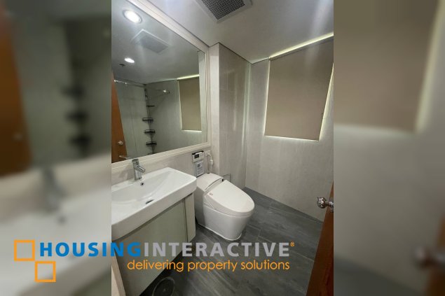 furnished 2br unit with parking for lease in amorsolo tower