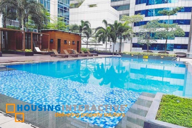 2br unit with parking and balcony for sale in three central