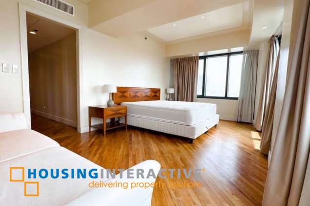 semi-furnished 4br unit with balcony and parking for lease in rizal tower