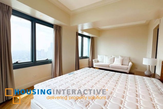 semi-furnished 4br unit with balcony and parking for lease in rizal tower