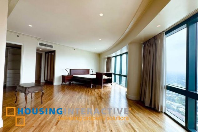 semi-furnished 4br unit with balcony and parking for lease in rizal tower