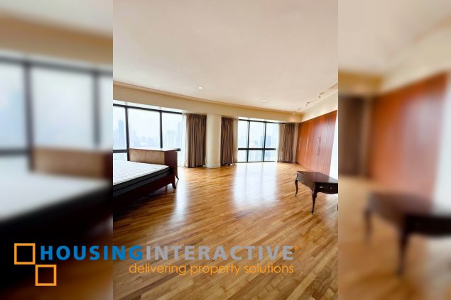semi-furnished 4br unit with balcony and parking for lease in rizal tower