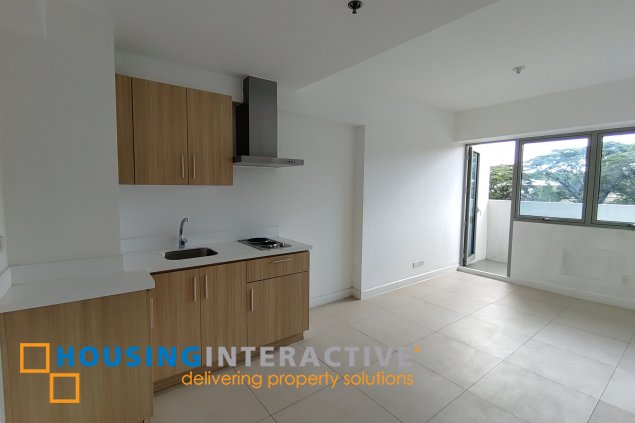 unfurnished 1 br condominium unit with 1 parking slot in the residences at commonwealth for sale