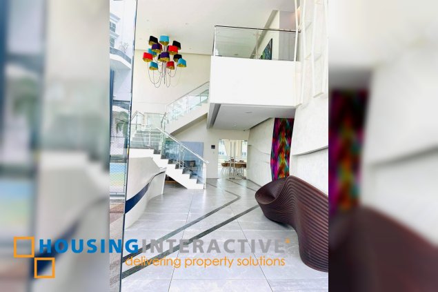 unfurnished 1 br condominium unit with 1 parking slot in the residences at commonwealth for sale