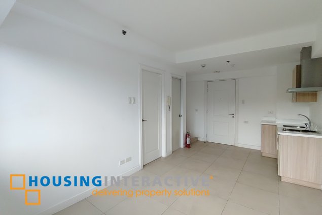 unfurnished 1 br condominium unit with 1 parking slot in the residences at commonwealth for sale