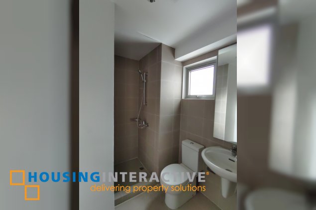 unfurnished 1 br condominium unit with 1 parking slot in the residences at commonwealth for sale