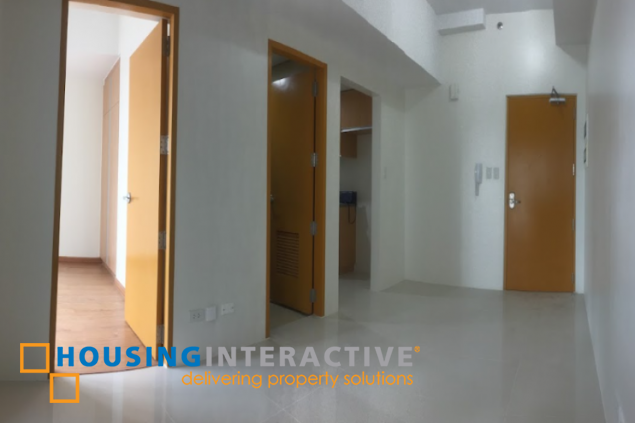 1br unit with balcony for sale in park avenue, bgc