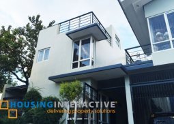 a 5 unit apartment with common garage (3 car parking space - 1 unit with its own parking)