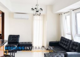 a semi furnished 1br condo unit for sale at venice residences, taguig