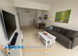 modern 1-bedroom unit with balcony for sale in paseo parkview suites