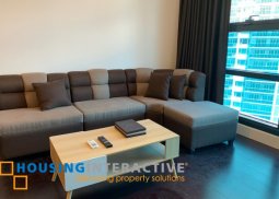 high-floor fully furnished unit at garden towers makati