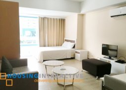fully furnished studio unit for rent at two central makati