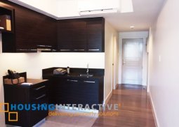 unfurnished studio unit for rent at the proscenium at rockwell makati